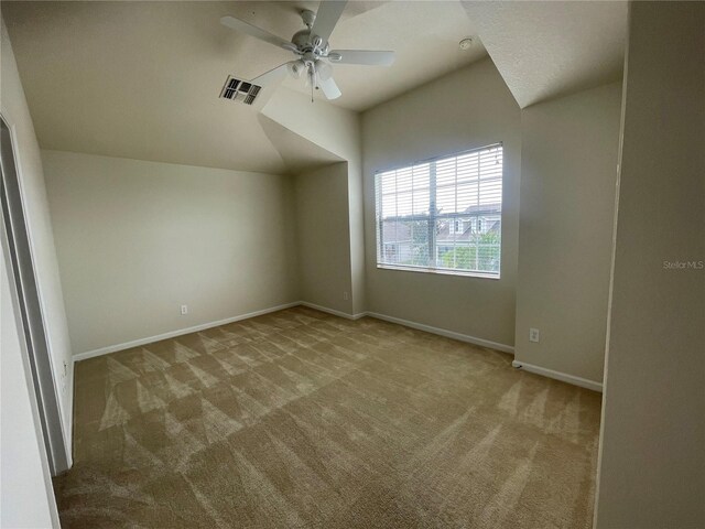 bonus room featuring carpet flooring and ceiling fan