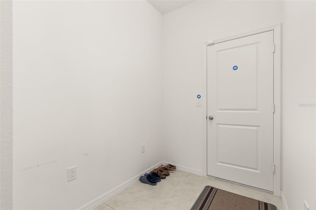 interior space with light tile patterned floors