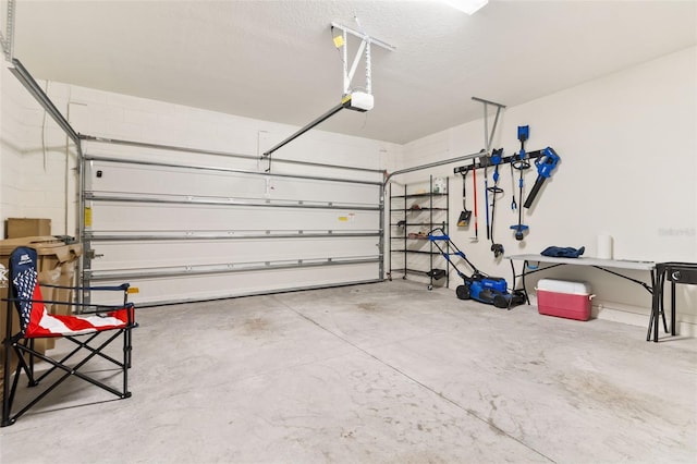 garage featuring a garage door opener