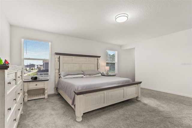 bedroom with light colored carpet