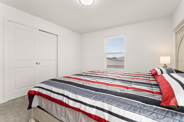 bedroom featuring a closet and carpet