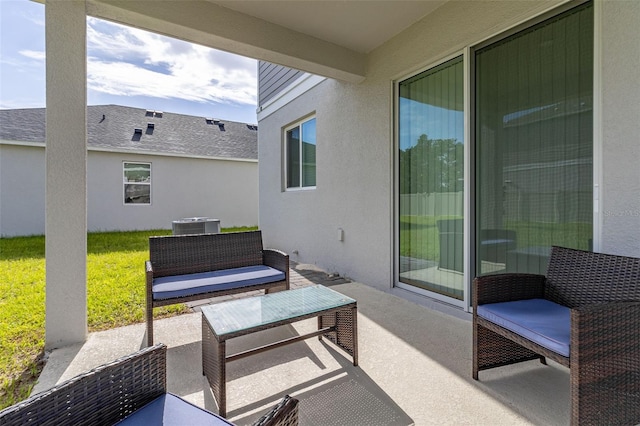 view of patio / terrace with central air condition unit and outdoor lounge area