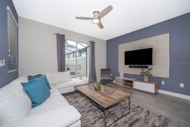 living room featuring ceiling fan