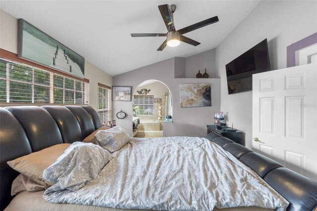 bedroom featuring ceiling fan and lofted ceiling