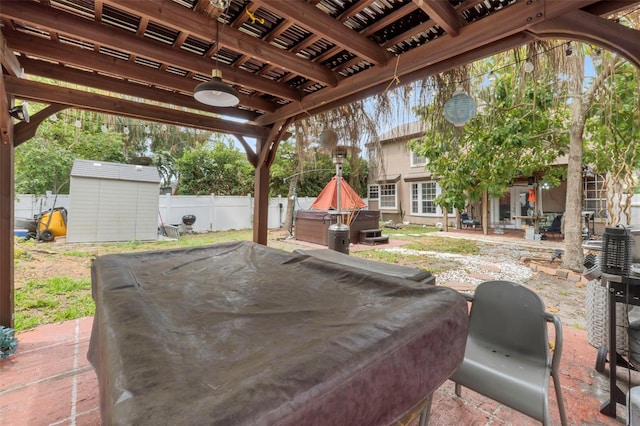 view of patio featuring a storage unit