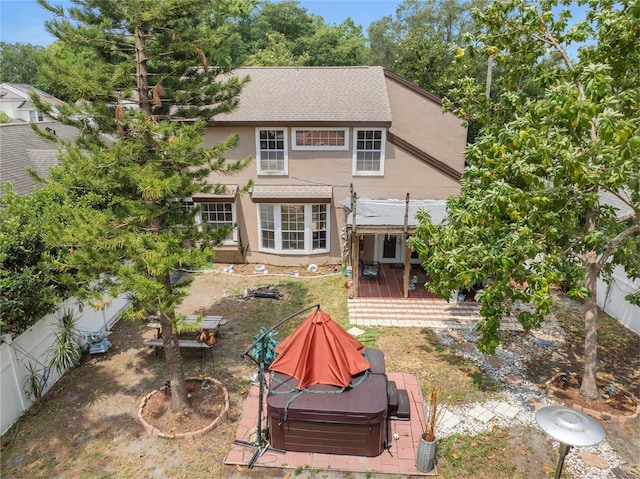 back of house featuring a patio area