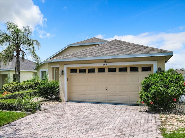 view of front of home featuring a garage