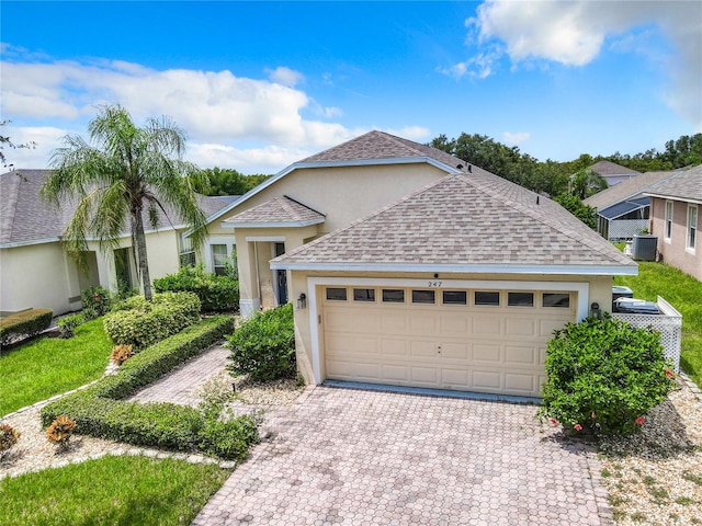 view of front of home with a garage