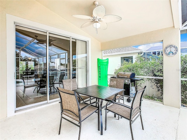 view of patio featuring ceiling fan and a grill