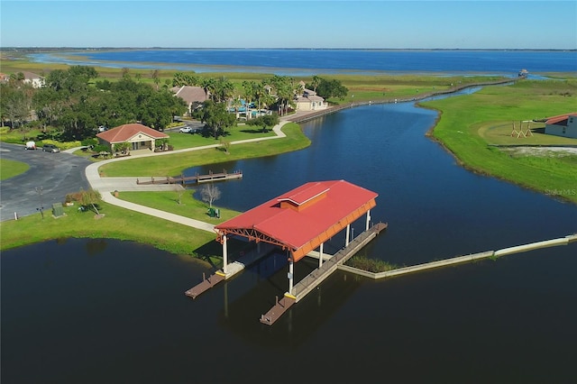 birds eye view of property featuring a water view