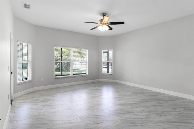 empty room with ceiling fan