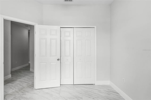 unfurnished bedroom featuring a closet