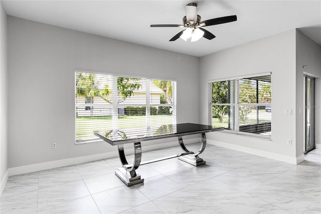 interior space featuring a wealth of natural light and ceiling fan