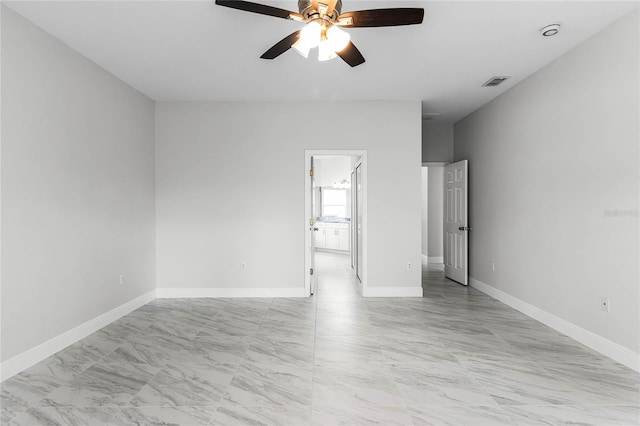 unfurnished bedroom featuring ceiling fan