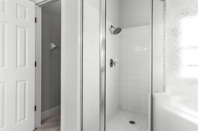 bathroom featuring an enclosed shower