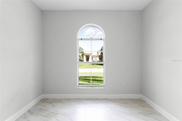 empty room featuring a wealth of natural light