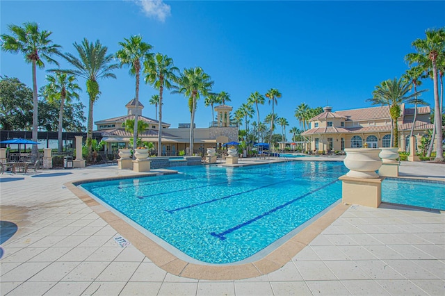 view of swimming pool featuring a patio