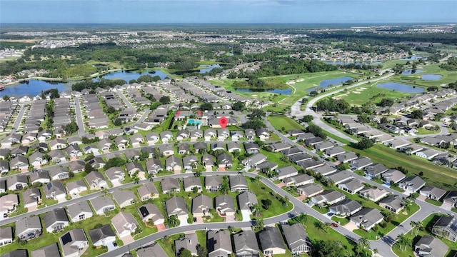 aerial view featuring a water view and a residential view