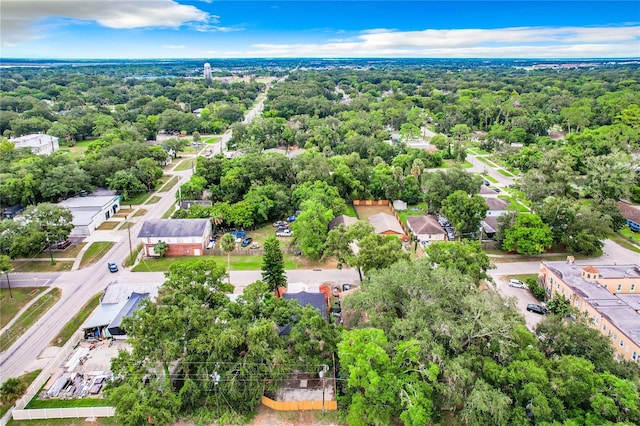 bird's eye view with a residential view and a wooded view