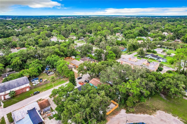 bird's eye view featuring a residential view and a forest view