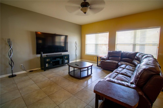 living room featuring ceiling fan and light tile patterned floors