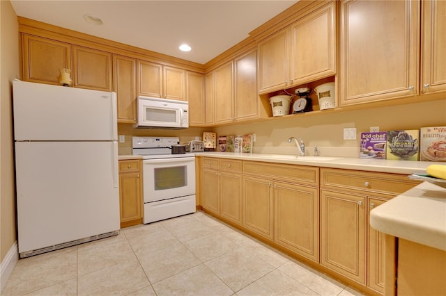 kitchen featuring light tile patterned flooring, white appliances, a sink, light countertops, and open shelves