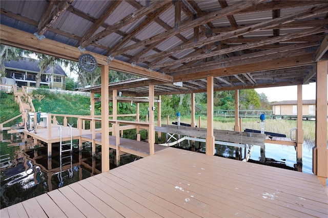 view of dock with boat lift