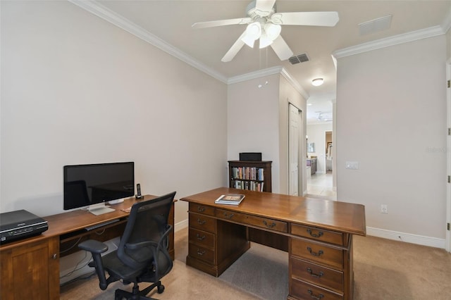 home office featuring ceiling fan, light carpet, and ornamental molding