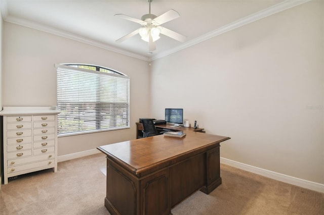 office area with ceiling fan, ornamental molding, and light carpet