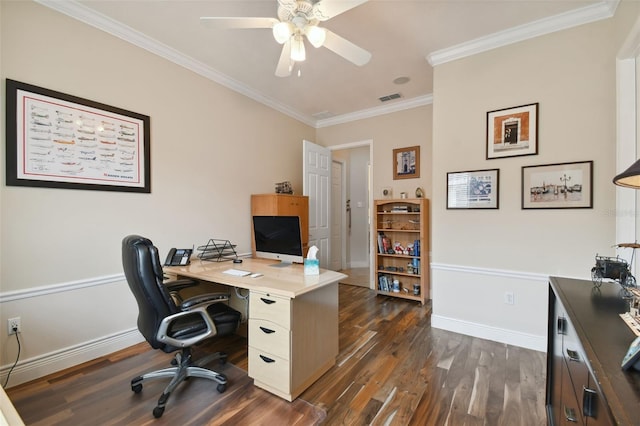 office area with ceiling fan, dark wood-type flooring, and ornamental molding