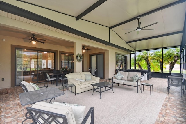 view of patio featuring ceiling fan and an outdoor living space