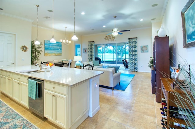 kitchen featuring a kitchen island with sink, sink, light stone countertops, ceiling fan, and stainless steel dishwasher