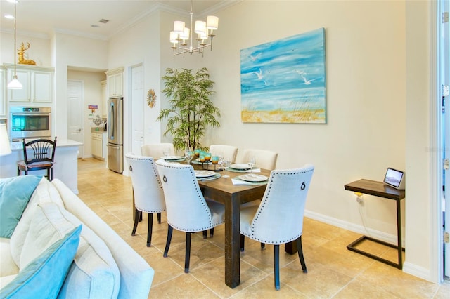 tiled dining room featuring ornamental molding and a chandelier