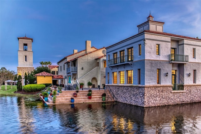 view of building exterior with a water view