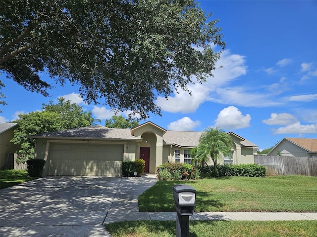 ranch-style house with a front yard and a garage