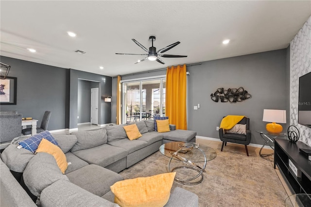 living room featuring ceiling fan