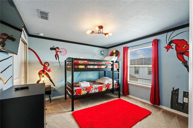 carpeted bedroom with crown molding and a textured ceiling