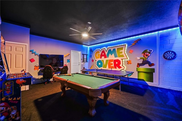 playroom featuring carpet, ceiling fan, and pool table