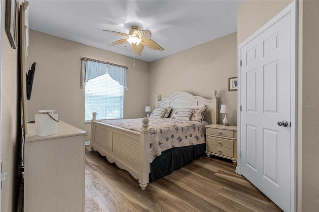 7671 Comrow St Unit 202, Kissimmee, FL 34747 - bedroom featuring wood finished floors and ceiling fan