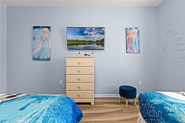 bedroom featuring light wood-type flooring