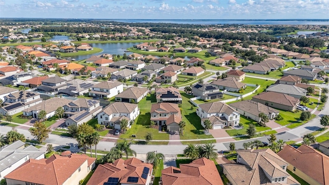 drone / aerial view with a water view