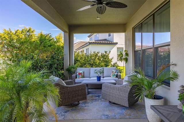 view of patio / terrace featuring an outdoor living space and ceiling fan