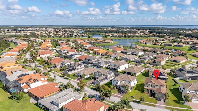 bird's eye view with a water view