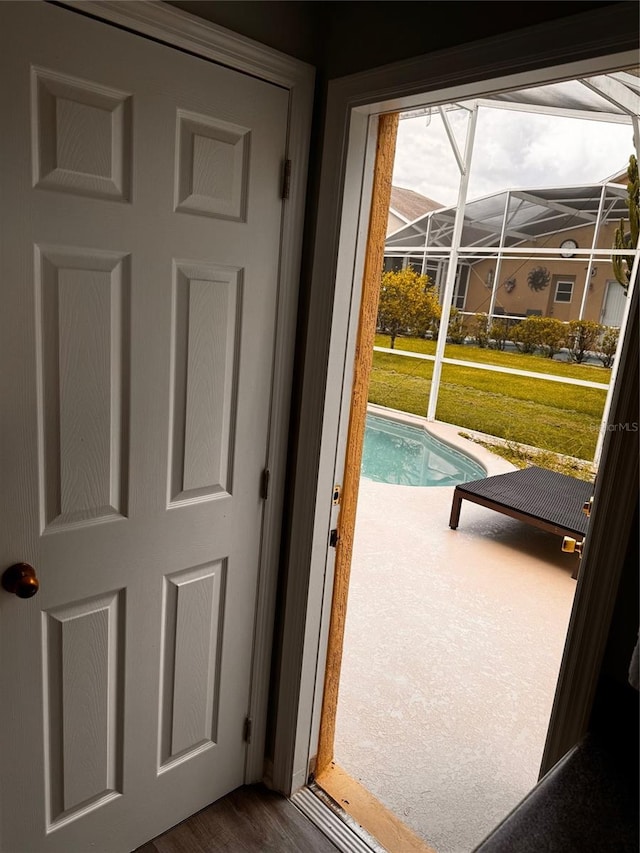 entryway with hardwood / wood-style flooring