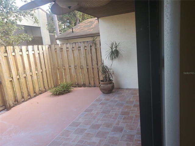 2647 Surrey Ct Unit 2647, Kissimmee, FL 34741 - view of patio featuring fence