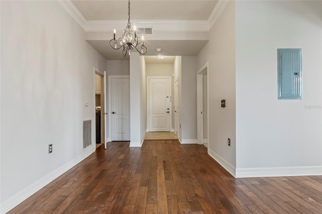 interior space featuring electric panel, crown molding, and dark wood-type flooring