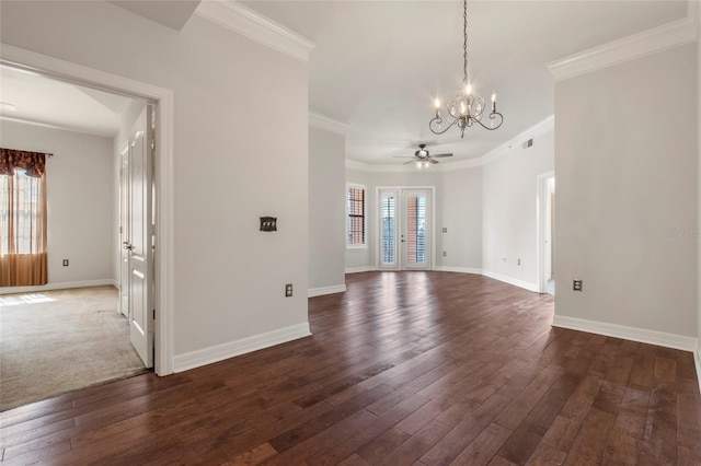 empty room featuring baseboards, dark wood-style flooring, and ceiling fan with notable chandelier