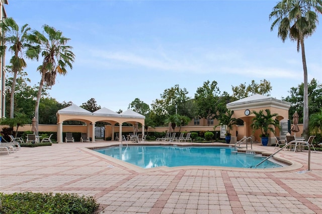 pool with a patio area