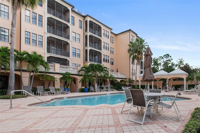 pool with a patio area