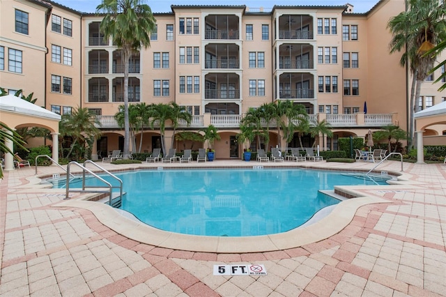 pool with a patio area